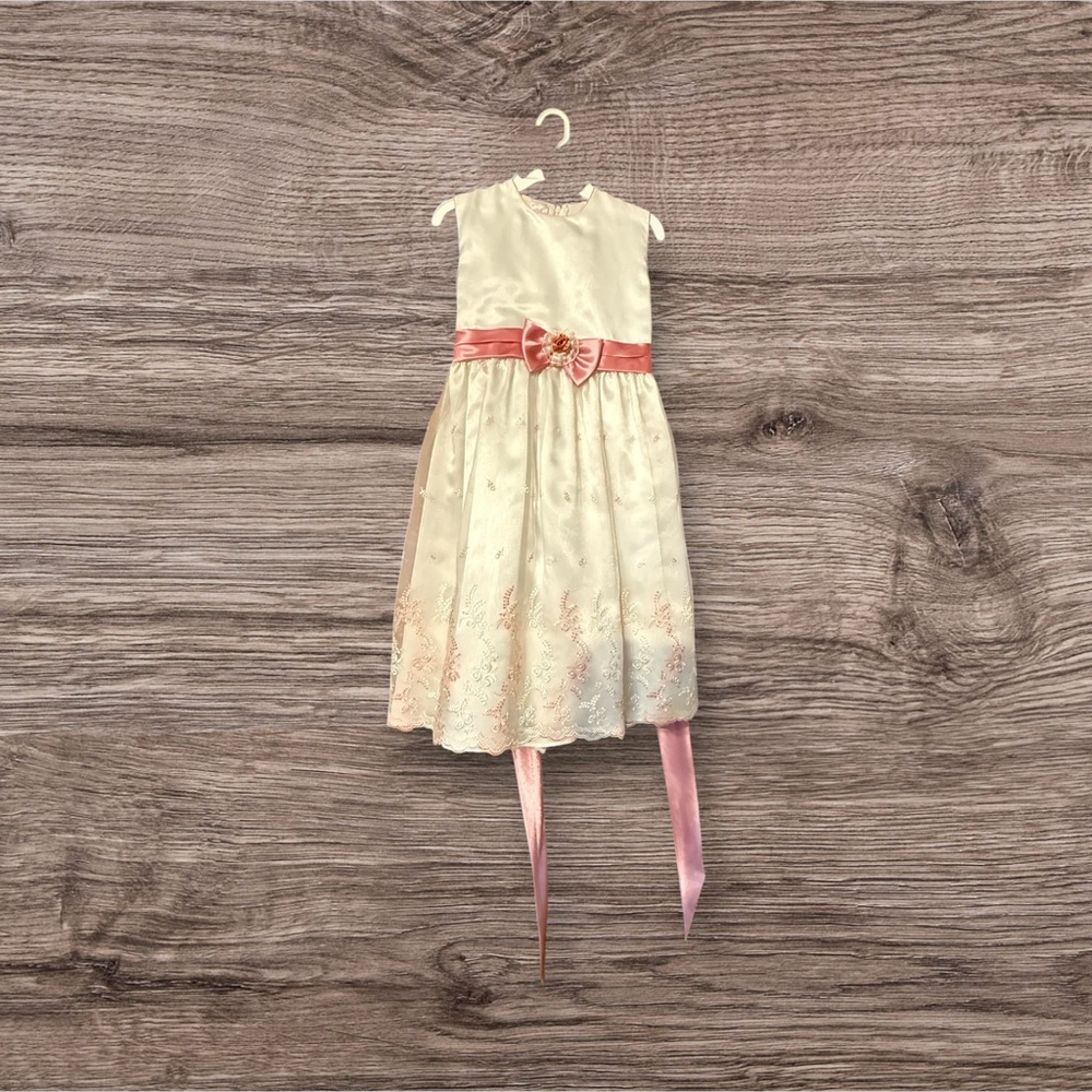 Elegant Cream Dress with Pink Sash